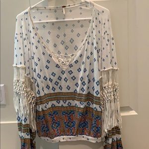 Free People top with fringes on sleeves